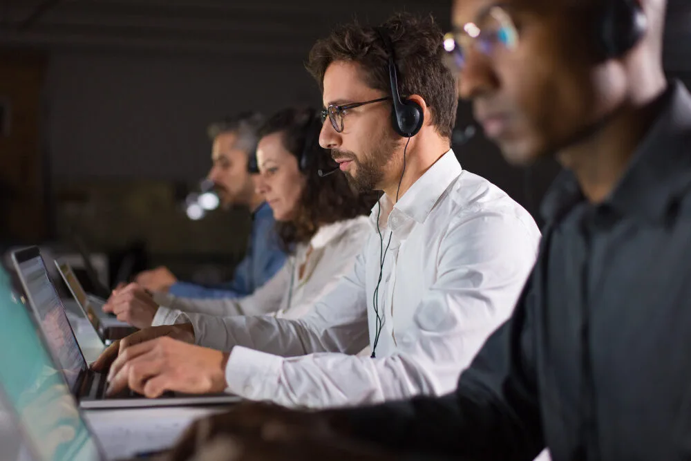 confident call center operator talking with client e1711595436204
